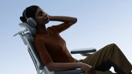 User experience: Relaxing in the HBADA X7 Smart chair with bio-synchronized support and thermal comfort.~scene