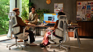 Modern European home office setup featuring the HBADA X7 flagship AI-powered ergonomic office chair.~scene