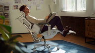 HBADA 2026 ergonomic chair in a modern home office setup for professional productivity.~scene