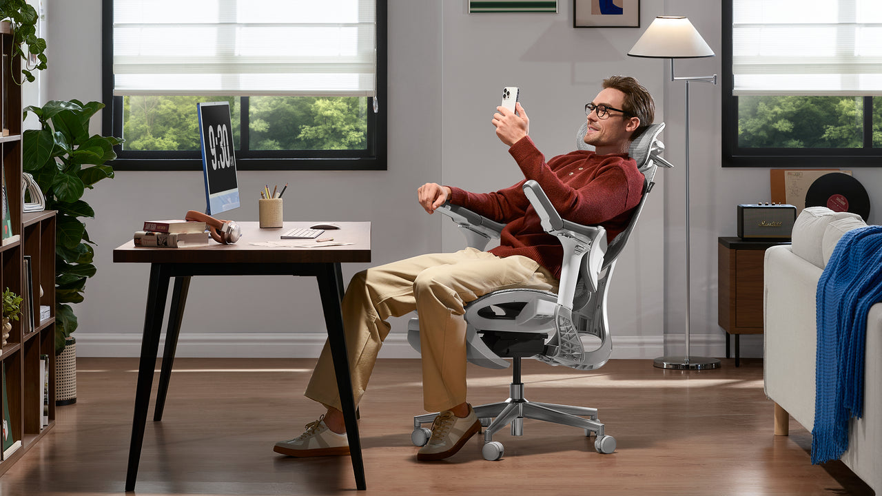 Comfortable home office environment with HBADA E3 Pro ergonomic chair for productivity.~scene