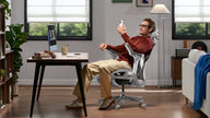 Comfortable home office environment with HBADA E3 Pro ergonomic chair for productivity.~scene
