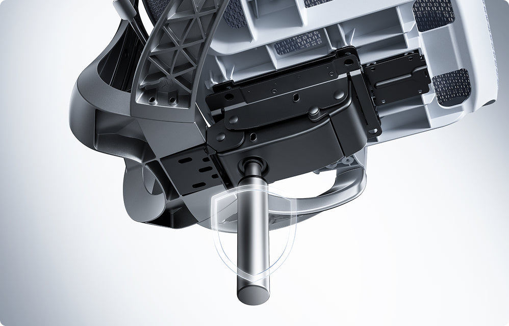 Close-up underside of an ergonomic office chair showing the tilt mechanism, seat frame and gas lift cylinder