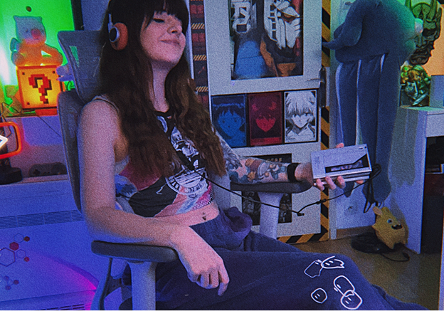 Customer seated in an HBADA chair at a gaming setup